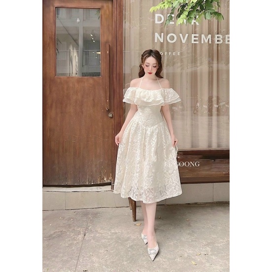 ĐẦM MIDI TRẮNG HOA NỔI TRỄ VAI BÈO DÂY CỘT YẾM