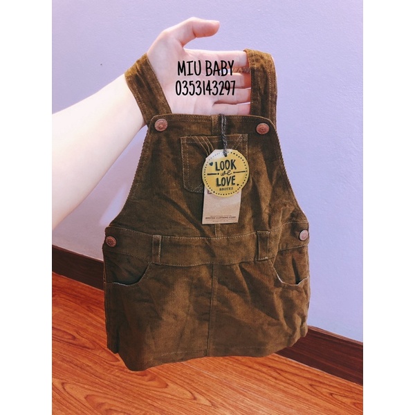 Yếm váy nâu xuat du bé gái