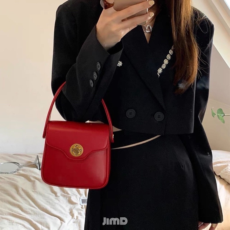 Túi xách thiết kế cao cấp khoá cài bông hoa - HAKEN