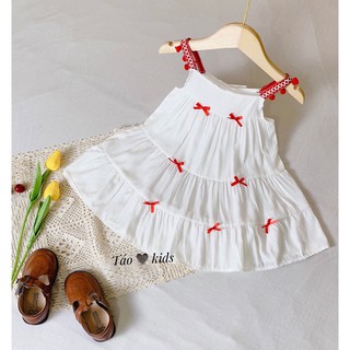 Váy 2 dây đũi trắng đính nơ đỏ
