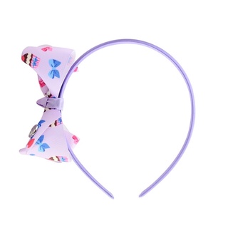 Cài tóc nơ pony cho bé gái