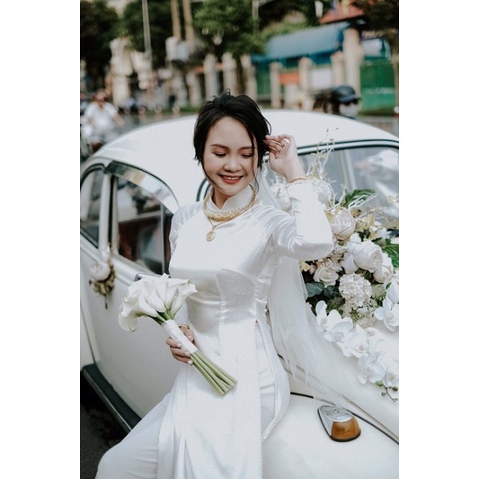 áo dài gấm trắng thái tuấn