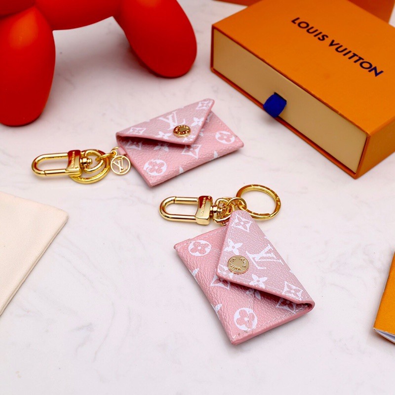 móc khoá thép chống bay màu + ví da nhỏ louis vuitton LV