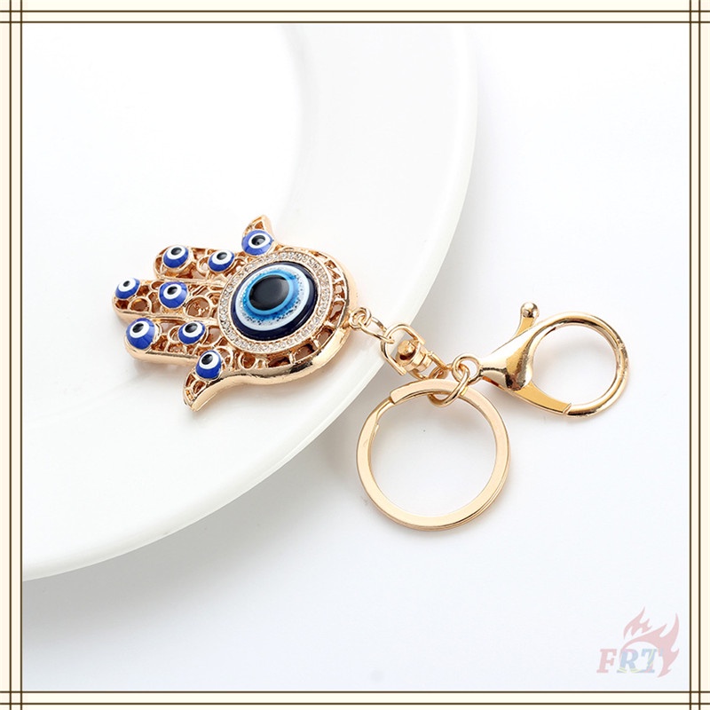 Móc chìa khóa hình bàn tay Hamsa Fatima với hình mắt quỷ độc đáo
