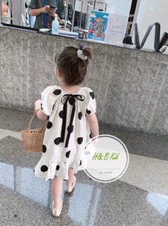 Váy chấm bi nơ đen cho bé gái