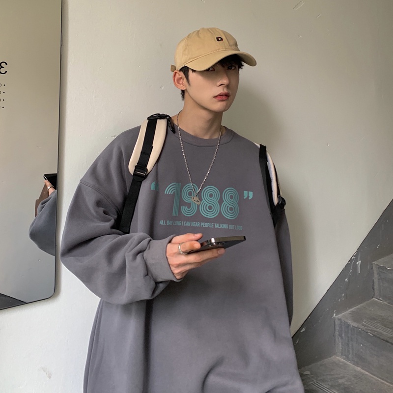 Áo sweater tay dài dáng rộng in họa tiết độc đáo thời trang mùa thu cho nam