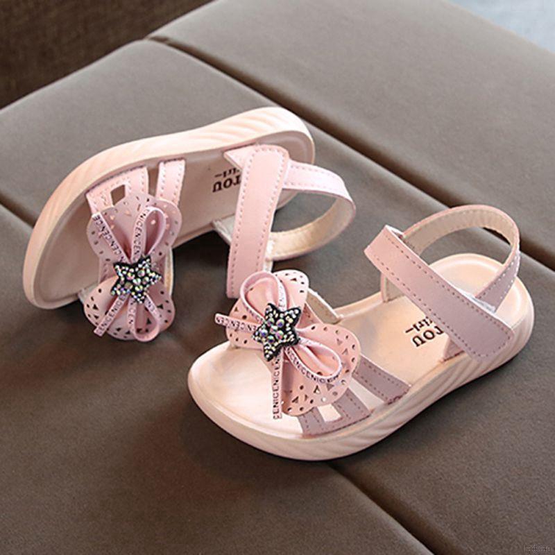 Giày sandal mềm đính nơ xinh xắn cho bé gái