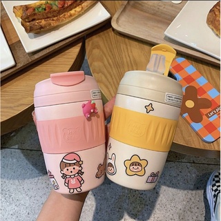 Bình nước gắn sticker siêu cute