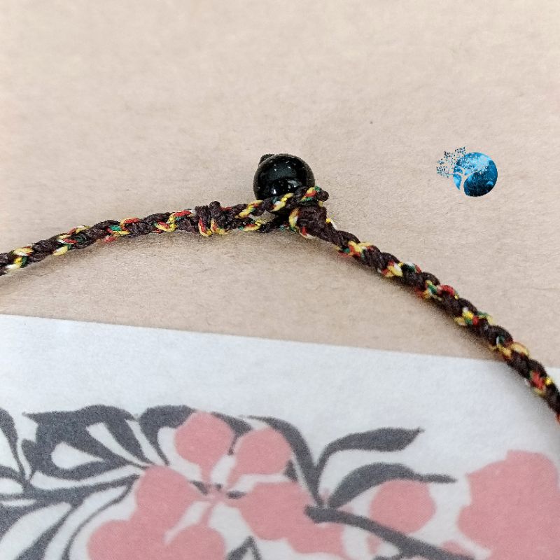 Vòng tay tết dây chỉ ngũ sắc mix charm hoa hướng dương