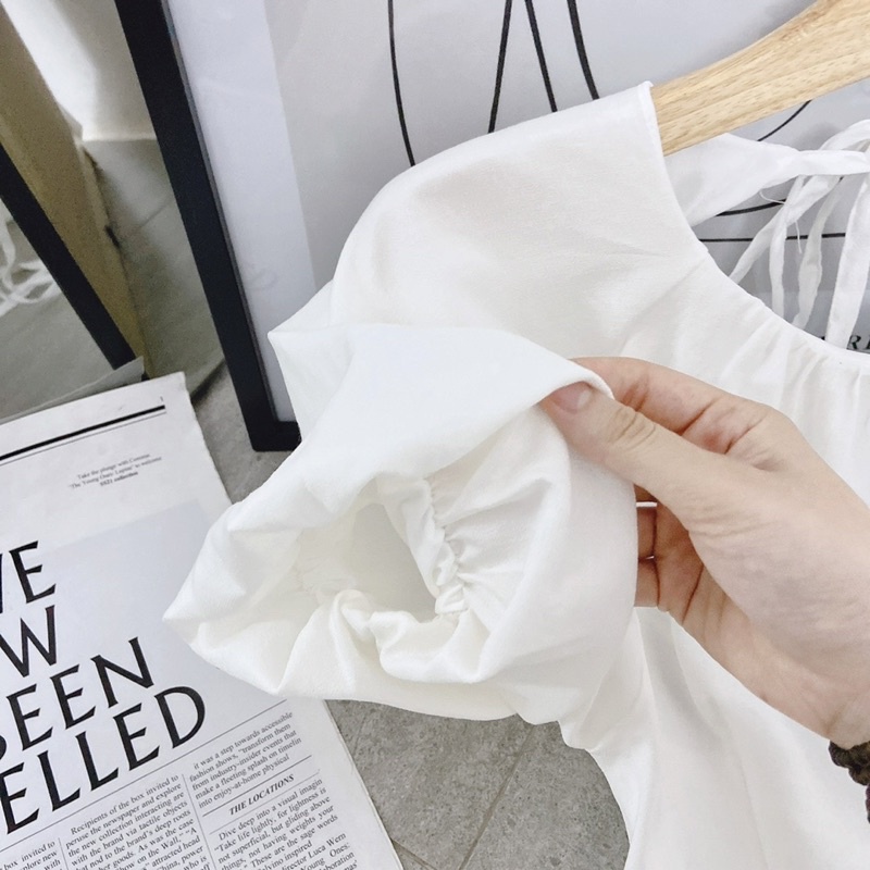 ĐẦM TRẮNG MIDI HỞ LƯNG NƠ SAU CỔ TRÒN