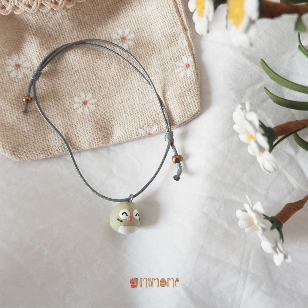 Vòng gốm chú chim xanh