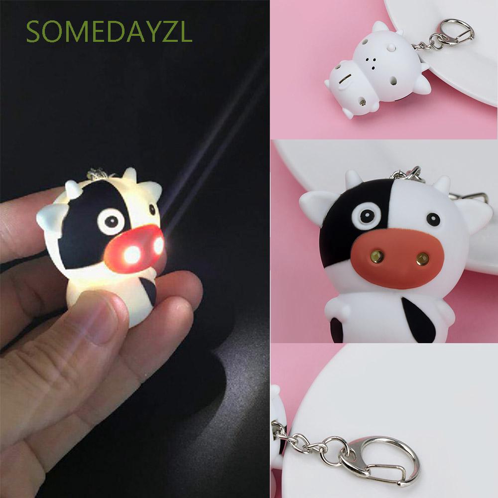 Móc chìa khóa in họa tiết bò sữa xinh xắn