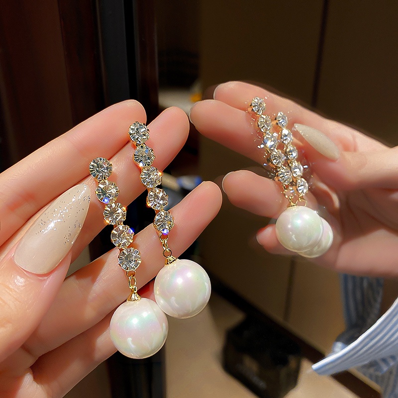 Khuyên tai tua rua dáng dài đính đá ngọc trai độc đáo