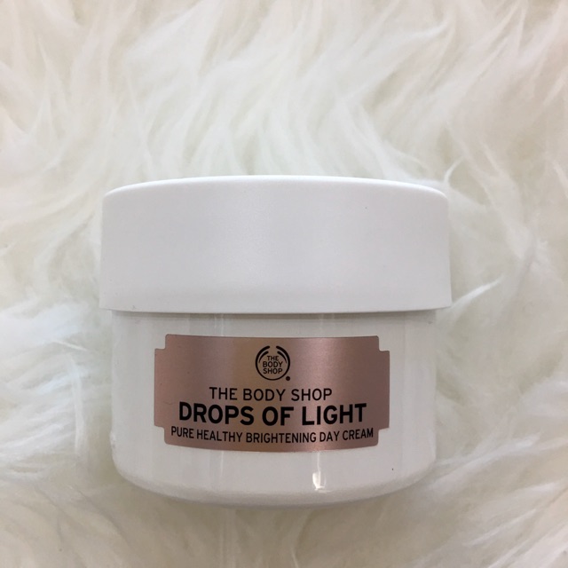 Kem dưỡng ban ngày The Body Shop Drops of Light Pure Healthy