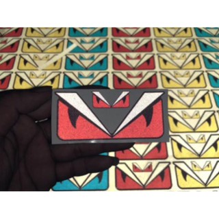 Tem mắt fendi phản quang 4x9cm