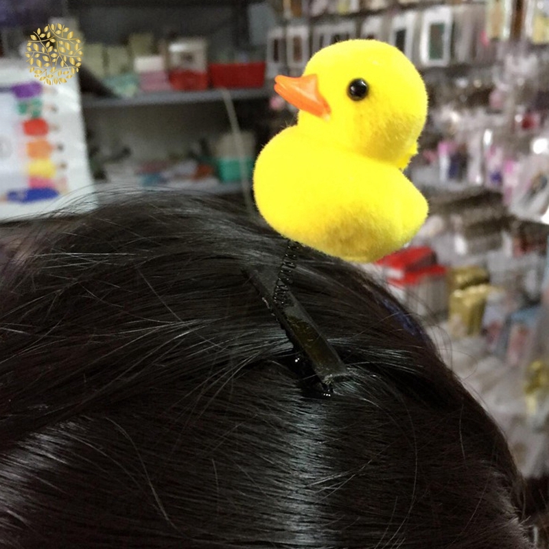 Kẹp tóc đính chú vịt siêu dễ thương cho nữ