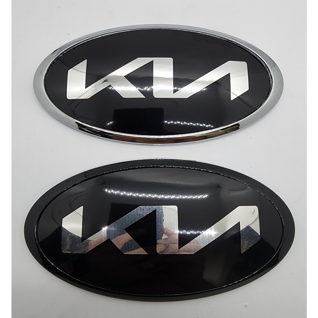 Bộ 2 Logo chính xe Kia Sedona/Carens/Morning