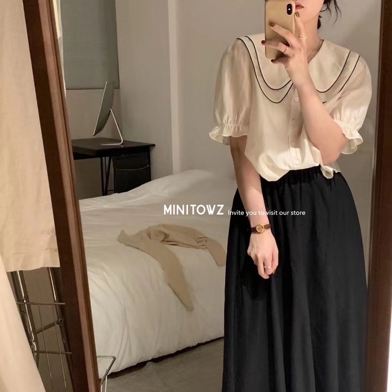 Áo cổ sen viền đen