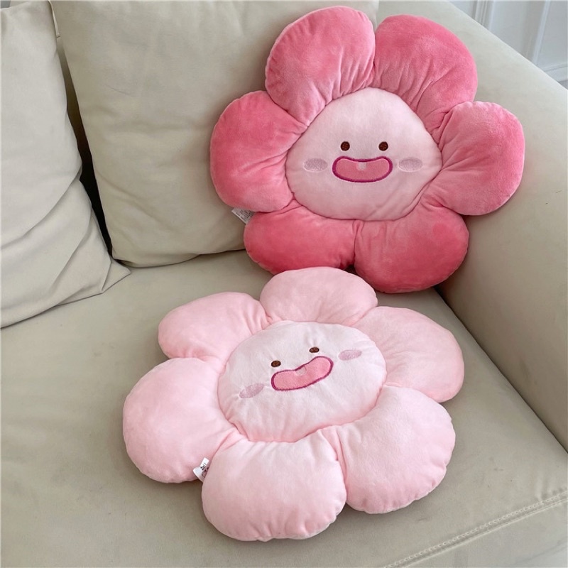 Gối bông hoa sún răng đáng yêu