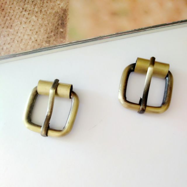 Khoá kim làm quai túi ví