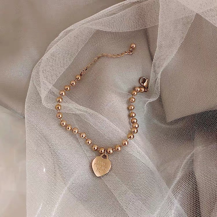 Vòng tay / lắc chân thép titan mạ vàng hồng 18k hình trái tim đơn giản chống thấm nước không gây dị ứng
