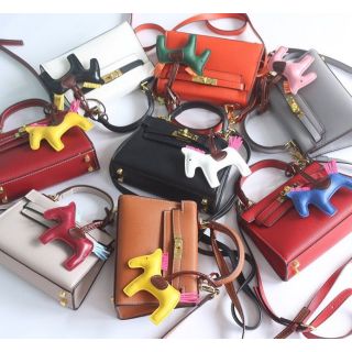 Túi xách tặng kém phụ kiện treo ngựa