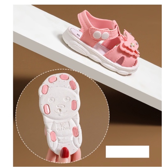 GIÀY SANDAL TẬP ĐI HÌNH NƠ VÀ HOA CÚC BẤM CHO BÉ