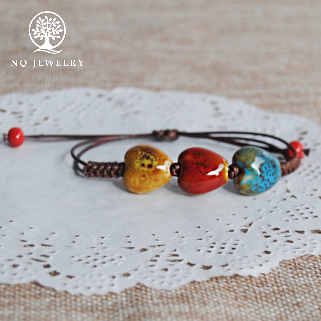 Vòng tay kết dây sáp hạt gốm sứ - NQ Jewelry