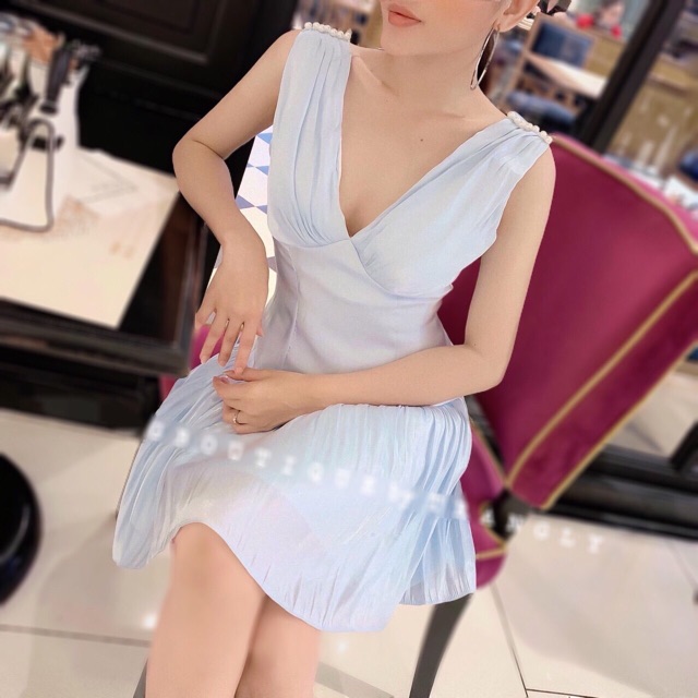 Set áo croptop hoa cột eo kèm chân váy dài đính nút | BigBuy360 - bigbuy360.vn