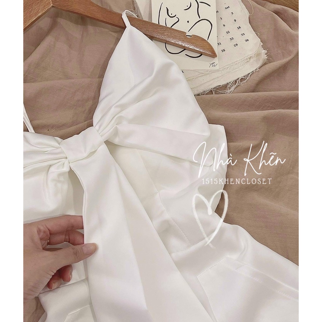 Đầm 2 dây mini trắng nơ ngực to