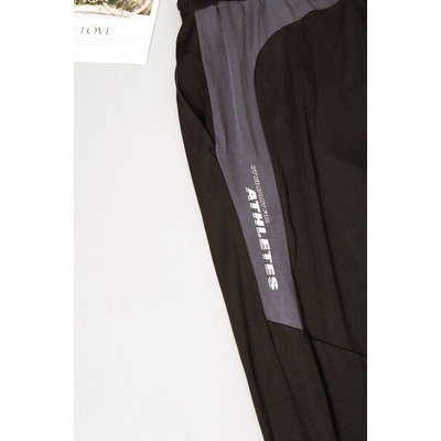 Quần thể thao dây rút Komont