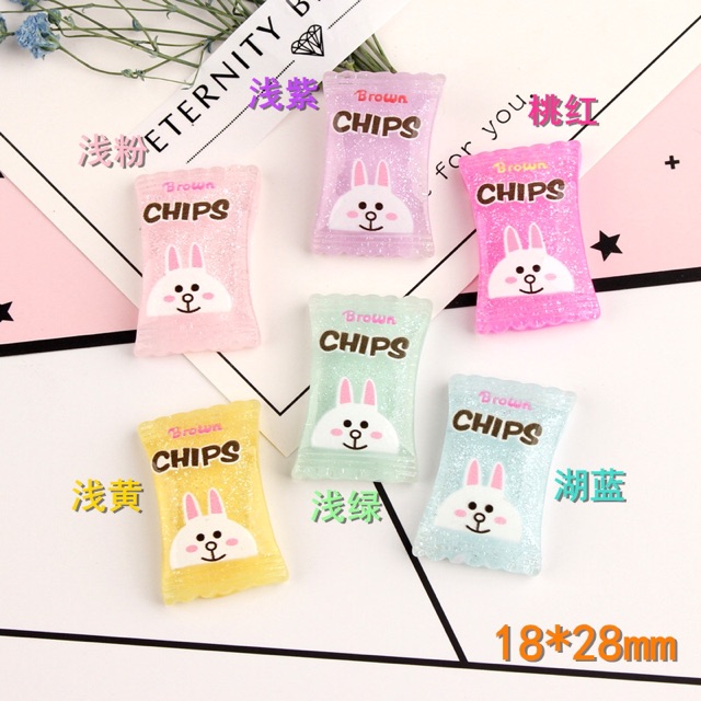 Mô hình kẹo chips gấu sweet trong suốt trái tim charm slime