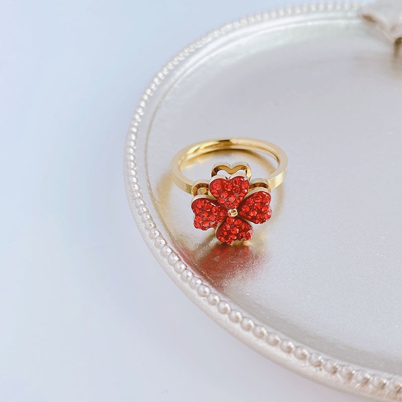 Nhẫn thép titan xoay cỏ bốn lá mạ vàng 18k thời trang sang trọng cho nữ