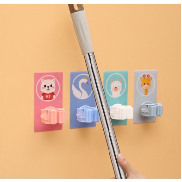 Móc dán tường kẹp giữ cây lau nhà , móc treo chổi chịu lực cao miếng dán to hoạt hình