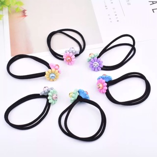 Sỉ 10 buộc tóc hoa mặt cười  37k