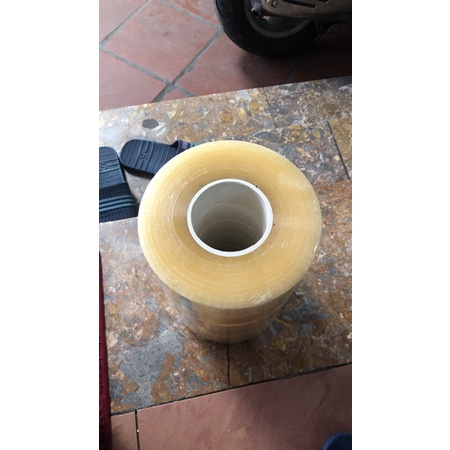 Băng dính trắng 1kg/cuộn lõi mỏng dính