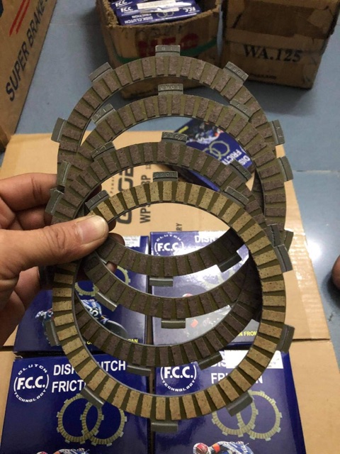 Bộ bố nồi + lá sắt nồi Exciter 150 zin hãng FCC