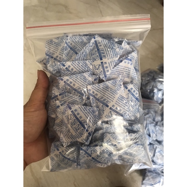 50 gói hút ẩm 10g — 500g chuyên dùng trong thực phẩm ,giày dép ,máy ảnh  ..v..v