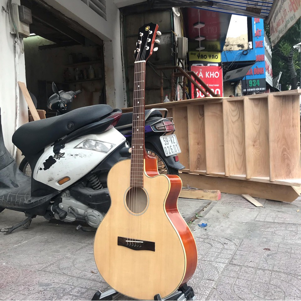 Đàn Guitar Acoustic giá rẻ cho người chơi ,có ty ,gỗ thịt nguyên tấm Tặng giáo trình tự học