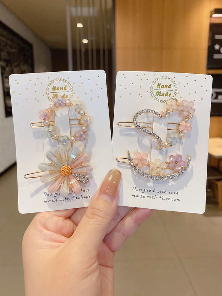 Kẹp tóc hình hoa cúc đính đá xinh xắn cho nữ