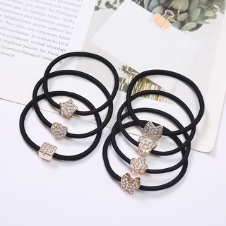 Dây buộc tóc cao su đen đính đá