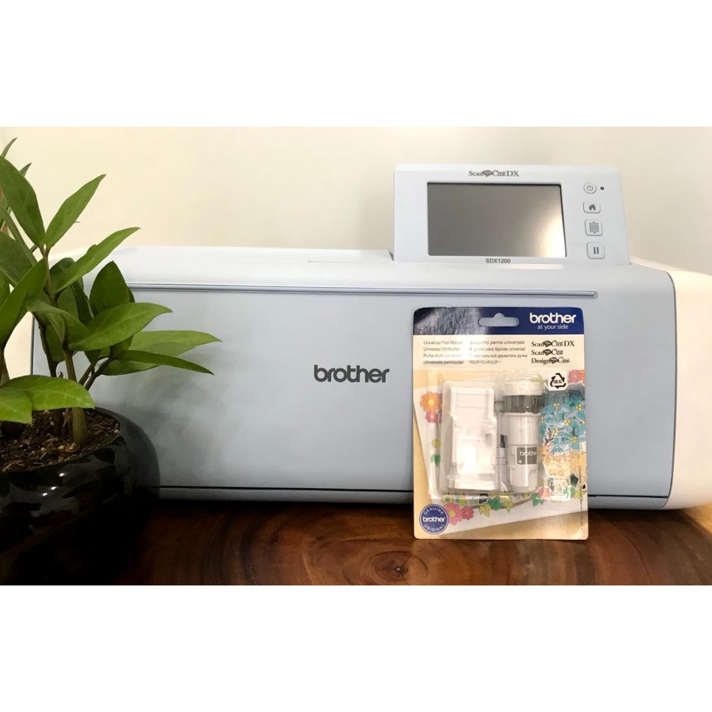 Dụng cụ giữ bút đa năng brother CAUNIPHL1