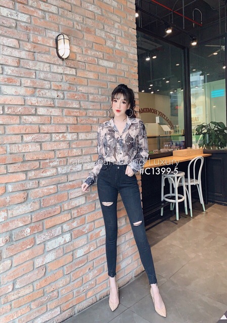 Quần jean nữ rách gối tua chân