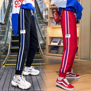 Quần jogger 3 sọc freesize 2 màu đen - đỏ