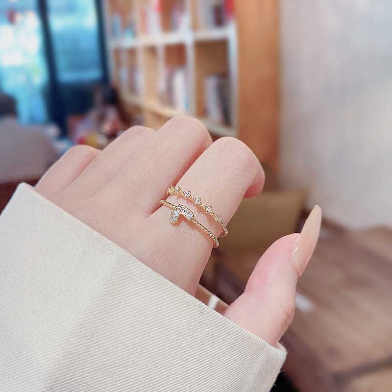 Nhẫn Đính Hôn Bằng Thép Titan Mạ Vàng Hai Lớp Đính Đá Zircon Hình Trái Tim Thời Trang Cho Nữ