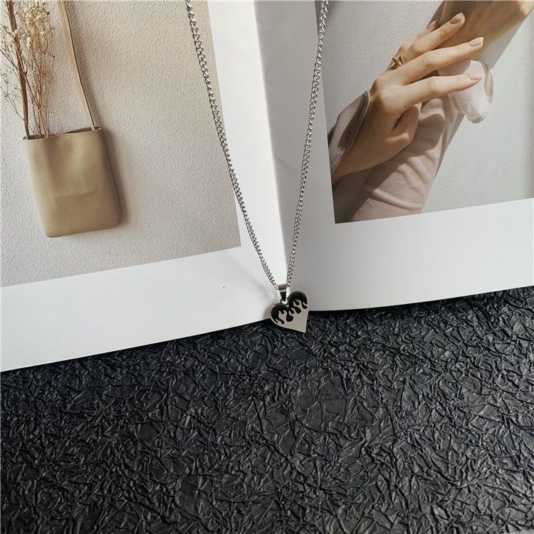 vòng cổ Thép Titan Mặt Trái Tim Thời Trang Cho Nam Nữ