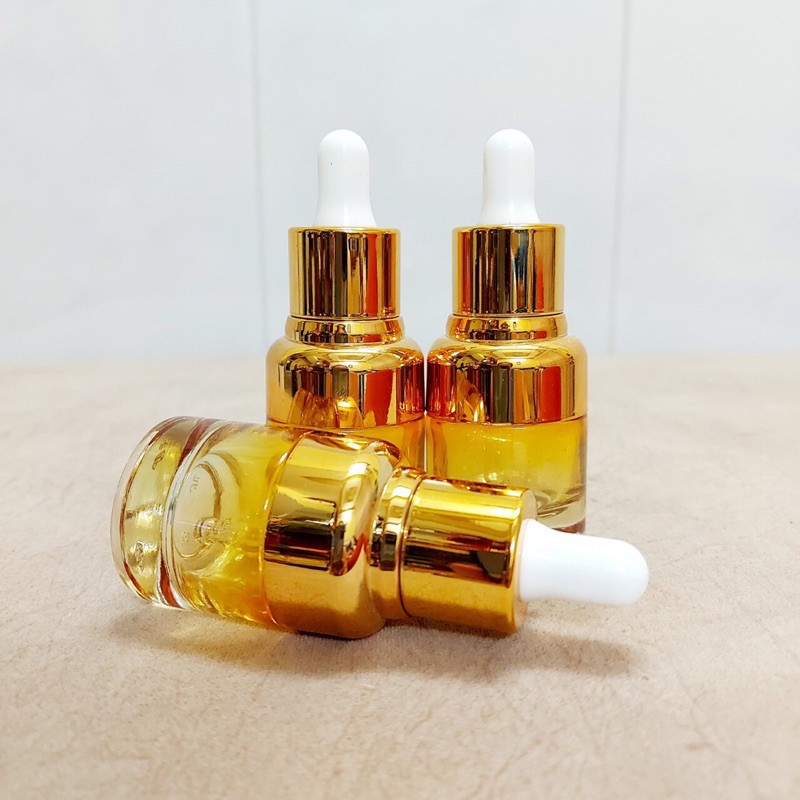 Chai lọ sang chiết mỹ phẩm - Chai serum vàng trong nắp bóp thường 20ml