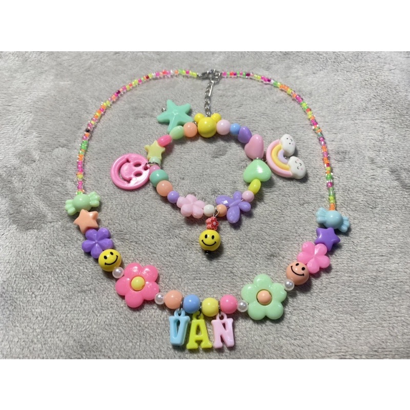 Bộ vòng tay và vòng cổ gắn tên theo yêu cầu