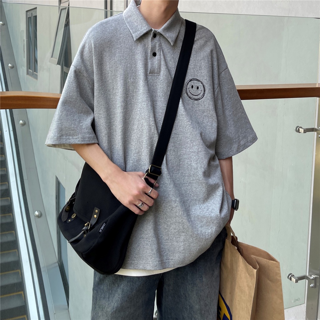 Áo thun polo ngắn tay dáng rộng in hình mặt cười phong cách Hàn Quốc cho nam và nữ