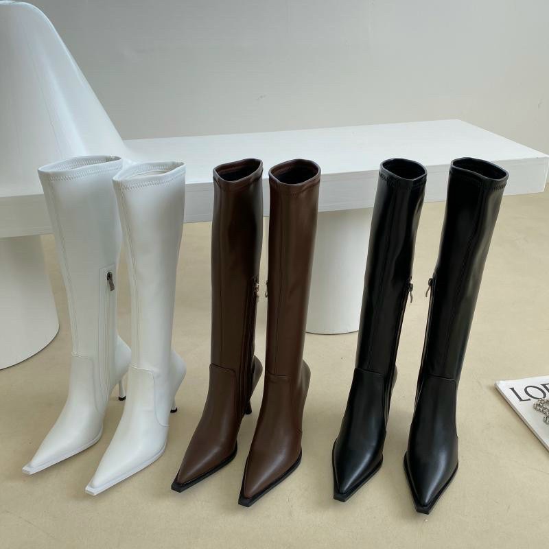 Boot đùi da lỳ mũi nhọn gót nhọn Mai phương Bùi